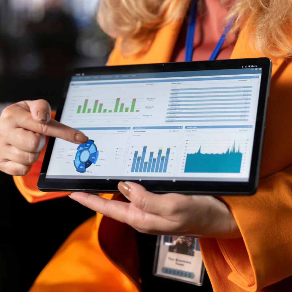 Digital marketer reviewing paid social campaign performance dashboard.