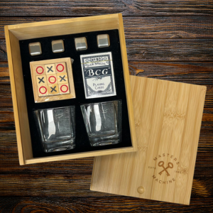 Wooden game night gift set with tic-tac-toe board, whiskey glasses, flask, and accessories displayed in a branded box